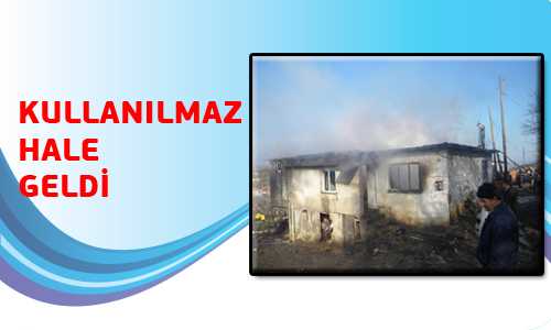 EVİ YANAN KADIN ÇARESİZ KALDI